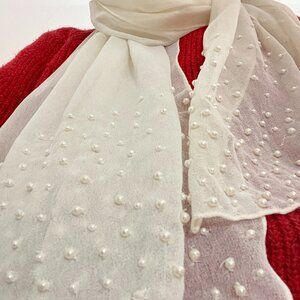 Pearl-studded wrap or scarf